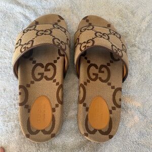 Men’s Gucci GG beige canvas slides